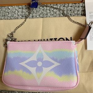 Sold!!!!!!!!    Louis Vuitton Escale mini pochette